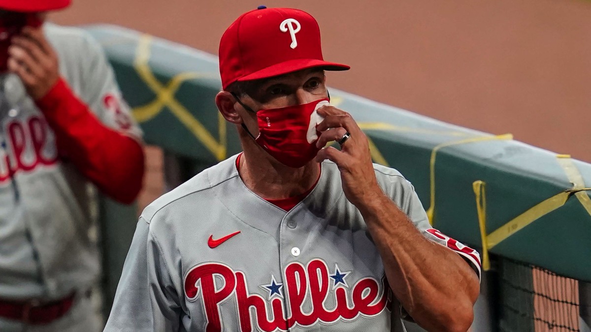 Philadelphia Phillies manager Joe Girardi (25) shown in the dugout against the Atlanta Braves during the seventh inning at Truist Park.